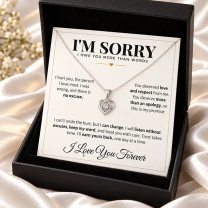 Heart apology necklace in a black gift box with an "I'm Sorry" message card