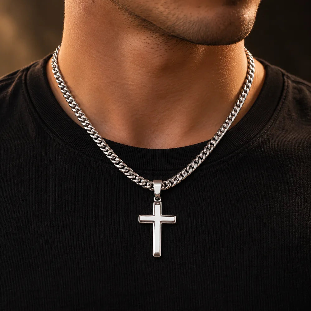 Cross on Cuban chain worn