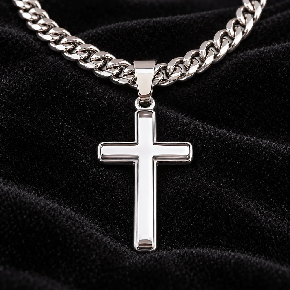 Polished artisan cross pendant close-up